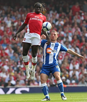 Arsenal v Wigan Athletic 2009-10 Collection: Bacary Sagna (Arsenal) Jason Koumas (Wigan)
