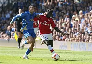 Images Dated 2nd May 2009: Bacary Sagna (Arsenal) Nadir Belhadj (Portsmouth)
