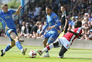 Bacary Sagna (Arsenal) Nadir Belhadj and Sean Davis(Portsmouth)
