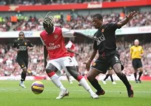 Images Dated 3rd November 2007: Bacary Sagna (Arsenal) Patrice Evra (Manchester United)