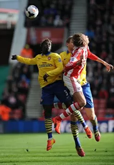 Images Dated 1st March 2014: Bacary Sagna (Arsenal) Peter Crouch (Stoke). Stoke City 1: 0 Arsenal. Barclays Premier League