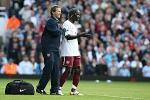 West Ham United v Arsenal 2007-08 Collection: Bacary Sagna (Arsenal) with physio Gary Lewin