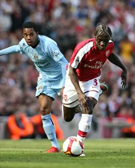 Images Dated 4th April 2009: Bacary Sagna (Arsenal) Robinho (Man City)