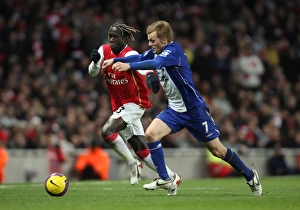 Images Dated 12th January 2008: Bacary Sagna (Arsenal) Seb Larsson (Birmingham)