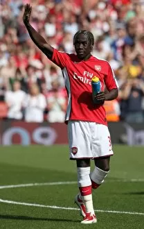 Arsenal v Chelsea 2008-09 Collection: Bacary Sagna (Arsenal) waves to his family before the match