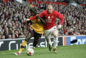 Manchester United v Arsenal 2008-09 Champions League 1-2 1st Leg Collection: Bacary Sagna (Arsenal) Wayne Rooney (Man Utd)