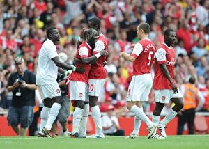 Bacary Sagna celebrates scoring Arsenals 2nd goal with Emmanuel Eboue