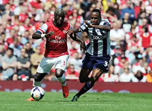 Arsenal V West Bromwich Albion 2013-14 Prints: Bacary Sagna Outmaneuvers Stephane Sessegnon: Arsenal vs West Bromwich Albion