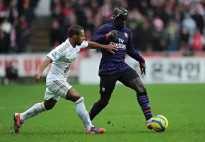 Bacary Sagna Outmaneuvers Wayne Routledge in Swansea v Arsenal FA Cup Clash