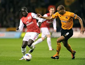 Wolverhampton Wanderers V Arsenal 2011-12 Prints: Bacary Sagna Outruns Carl Henry: Wolverhampton Wanderers vs Arsenal