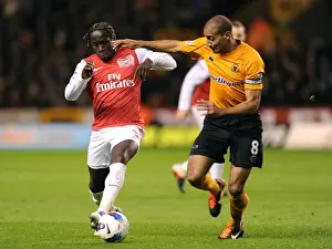 Wolverhampton Wanderers V Arsenal 2011-12 Prints: Bacary Sagna Outsmarts Carl Henry: A Premier League Battle at Molineux, 2012