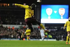 Images Dated 19th January 2011: Bacary Sagna shoots past Leeds goalkeeper Kasper Schmeichel to score the 2nd Arsenal goal
