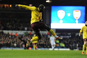 Leeds United v Arsenal FA Cup 2010-11 Collection: Bacary Sagna shoots past Leeds goalkeeper Kasper Schmeichel to score the 2nd Arsenal goal