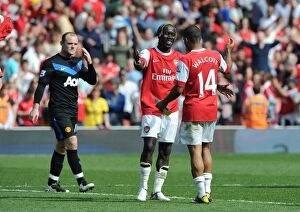 Bacary Sagna and Theo Walcott (Arsenal) Wayne Rooney (Man United). Arsenal 1