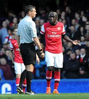 Images Dated 22nd March 2014: Bacary Sagna vs. Andre Marriner: A Clash of Willms at Stamford Bridge - Chelsea vs