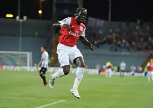 Udinese V Arsenal 2011-12 Prints: Bacary Sagna's Celebration: Arsenal's Winning Moment Against Udinese in 2011 Champions League Play-Off
