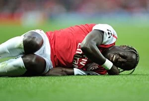 Arsenal v Udinese 2011-12 Collection: Bacary Sagna's Injury: Arsenal v Udinese, UEFA Champions League Play-Off 2011