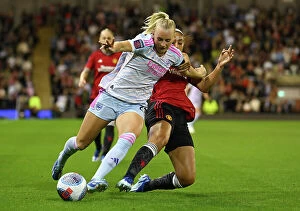 Manchester United Women v Arsenal Women 2023-24 Collection: Battle in the Barclays Women's Super League: Manchester United vs Arsenal FC