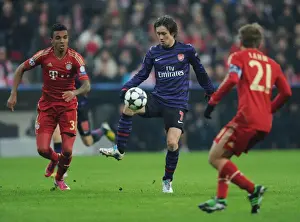 Bayern Munich V Arsenal 2012-13 Prints: Battle for Control: Rosicky vs