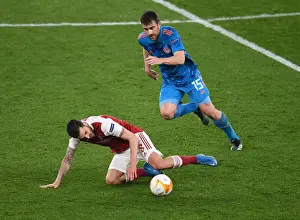 Empty Battle: Dani Ceballos vs Sokratis in Arsenal's Europa League Clash Against Olympiacos