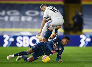 Leeds United V Arsenal 2020-21 Prints: Battle at Elland Road: Willock vs. Alioski - A Premier League Clash of Supremacy