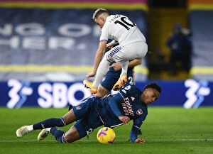 Images Dated 22nd November 2020: Battle at Elland Road: Willock vs. Alioski - A Premier League Clash of Supremacy