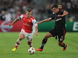 Besiktas V Arsenal 2014-15 Prints: Battle in Istanbul: Wilshere vs Pektemek - Arsenal vs Besiktas