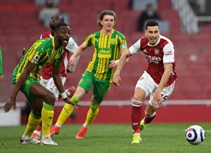 Images Dated 9th May 2021: Empty Battle: Martinelli vs. Ajayi at the Ghostly Emirates - Arsenal vs