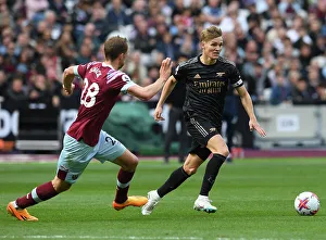 West Ham United V Arsenal 2022-23 Prints: Battle for Midfield Dominance: Odegaard vs. Soucek at London Stadium