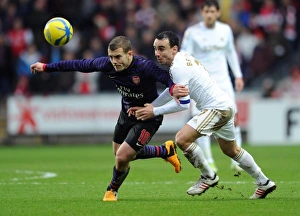 Battle of Midfield: Jack Wilshere vs. Leon Britton - FA Cup Showdown, 2013: Arsenal's Wilshere Outmaneuvers Swansea's Britton