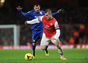 Arsenal V Cardiff City 2013-14 Prints: Battle in the Midfield: Jack Wilshere vs