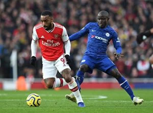 Arsenal v Chelsea 2019-20 Collection: Battle of the Midfield Masters: Lacazette vs. Kante in Arsenal vs. Chelsea Showdown