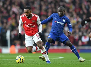 Arsenal V Chelsea 2019-20 Prints: Battle of the Midfield Masters: Lacazette vs. Kante in Arsenal vs. Chelsea Showdown
