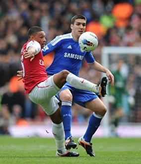 Arsenal V Chelsea 2011-12 Prints: Battle of the Midfield: Oxlade-Chamberlain vs. Romeu in Arsenal vs. Chelsea Clash