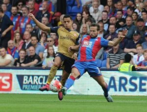 Images Dated 16th August 2015: Battle of the Midfield: Sanchez vs Cabaye - Crystal Palace vs Arsenal (2015-16)