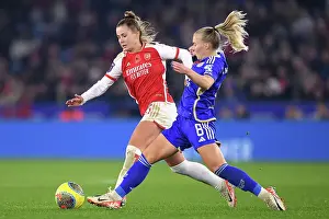 Leicester City Women V Arsenal Women 2023-24 Prints: Battle for Possession: Victoria Pelova's Intense Duel with Jutta Rantala - Arsenal FC vs