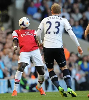 Tottenham Hotspur V Arsenal 2013-14 Prints: Battling for Control: Sagna vs. Eriksen in the Premier League Showdown