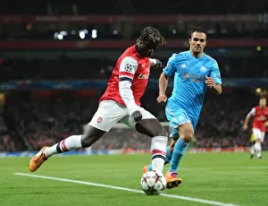 Arsenal V Marseille 2013-14 Prints: Battling Cross: Sagna vs. Morel in Arsenal's UEFA Champions League Clash (2013)