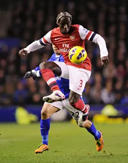 Everton V Arsenal 2012-13 Prints: Battling Past: Sagna Outmaneuvers Pienaar in Everton vs Arsenal Clash (2012-13)