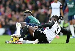 Battling for Possession: Saka vs. Bassey in the Fulham vs. Arsenal Premier League Clash (2023-24)