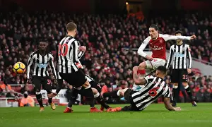 Arsenal V Newcastle United 2017-18 Prints: Bellerin vs Lascelles: Intense Shootout at Arsenal's Emirates Stadium - Arsenal v Newcastle United