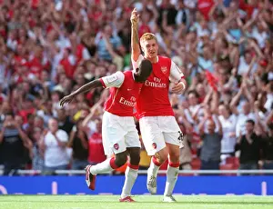 Arsenal V Paris Saint Germain 2007-08 Prints: Bendtner and Eboue: Arsenal's Unforgettable Celebration after Scoring against Paris Saint-Germain (2:1)