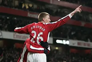 Bendtner and Sagna: Celebrating Arsenal's 1-0 Win Over Bolton Wanderers in the Premier League
