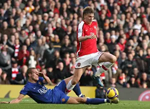 Arsenal V Manchester United 2008-09 Prints: Bendtner vs Vidic: Arsenal's Edge over Manchester United in the 2008 Premier League Clash