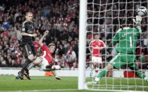 Bendtner's Brilliant Strike: Arsenal's 2-1 Victory Over Liverpool in Carling Cup