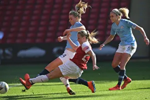 Beth Mead (Arsenal) Gemma Bonner (Man City)