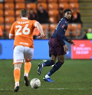 Images Dated 5th January 2019: Blackpool vs Arsenal: A FA Cup Battle - Medley vs Davies