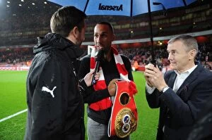 Images Dated 24th October 2015: Boxing Champion James DeGale's Half-Time Chat with Arsenal's Nigel Mitchell and Jimmy McDonnell
