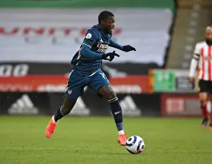 Empty Bramall Lane: Nicolas Pepe of Arsenal in Premier League Clash Amidst COVID-19 Restrictions