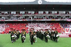 The Brass Band march around the pitch. Arsenal 4: 2 Wigan Athletic